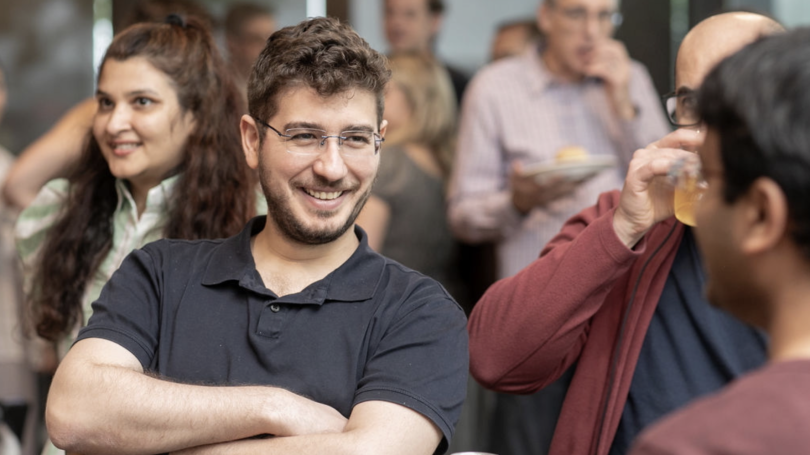 Advisor360° employees chat with one another. 